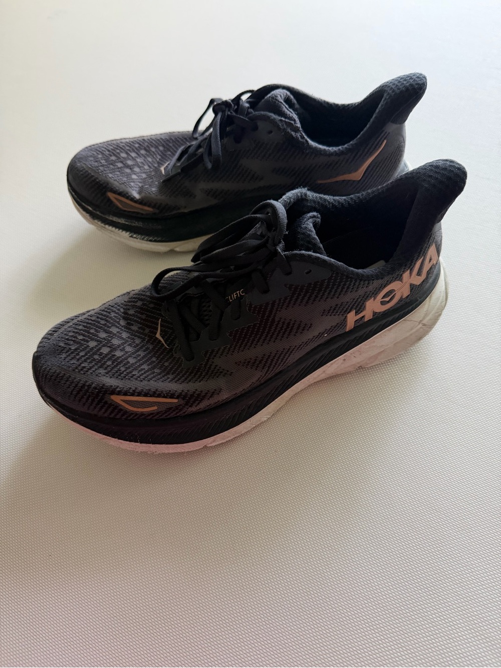 Hoka Women’s Black Running Shoes with Rose Gold Accents